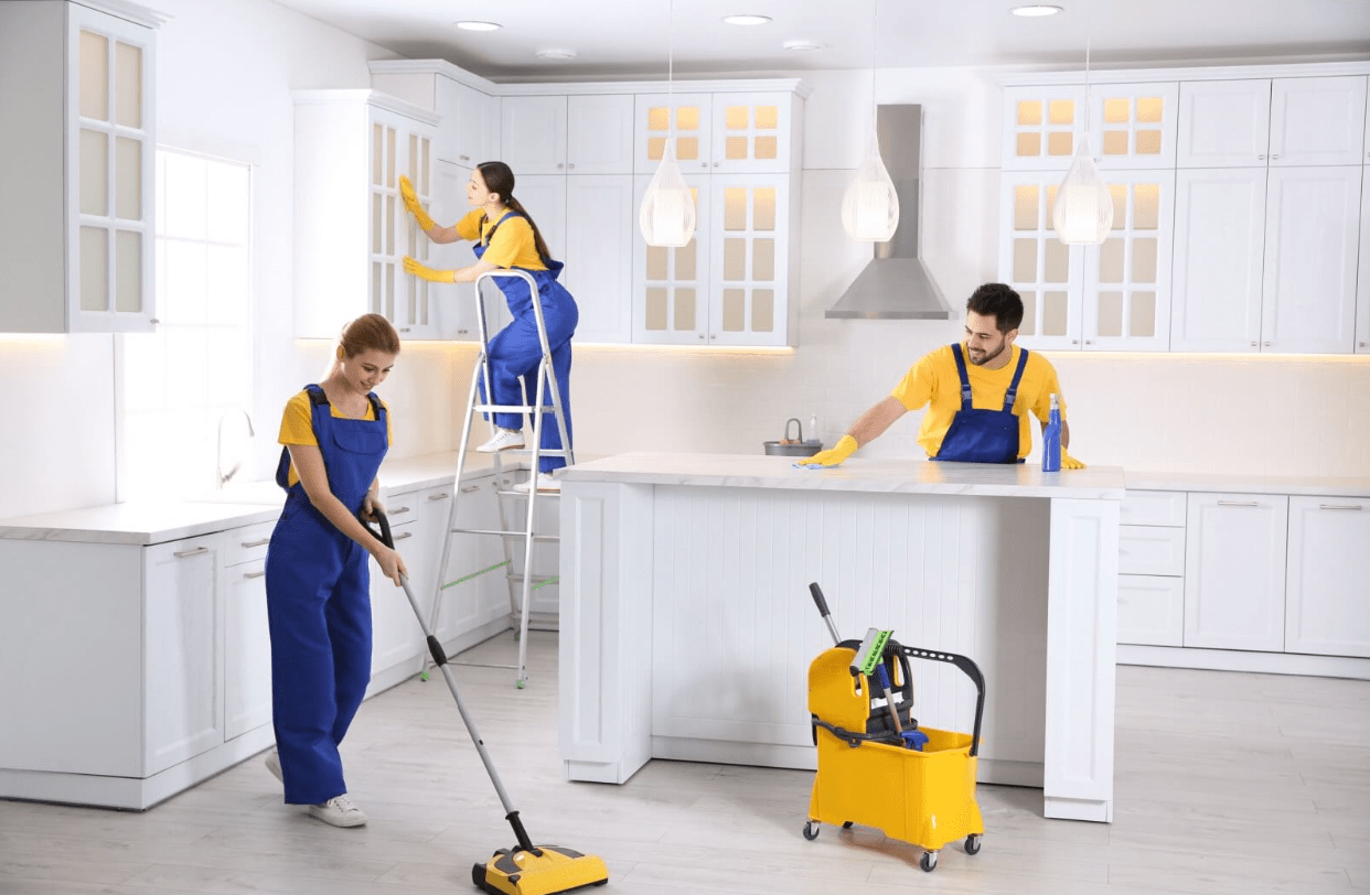 Cleaning team cleaning a kitchen reno.