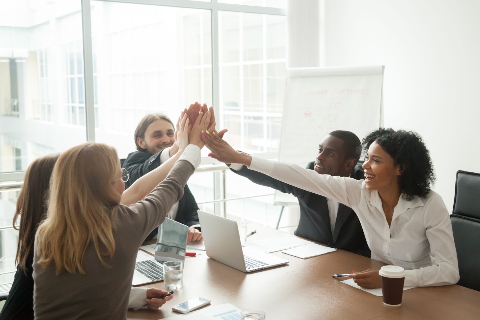 A group of employees are productive in a clean space.