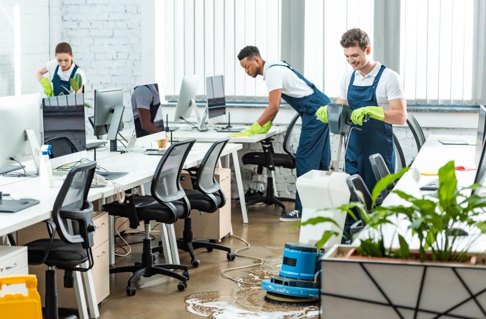 Cleaning team cleaning an office.