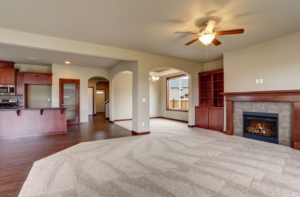 A picture of a beautiful living room that just had the carpets professionally cleaned, and you can see the difference.