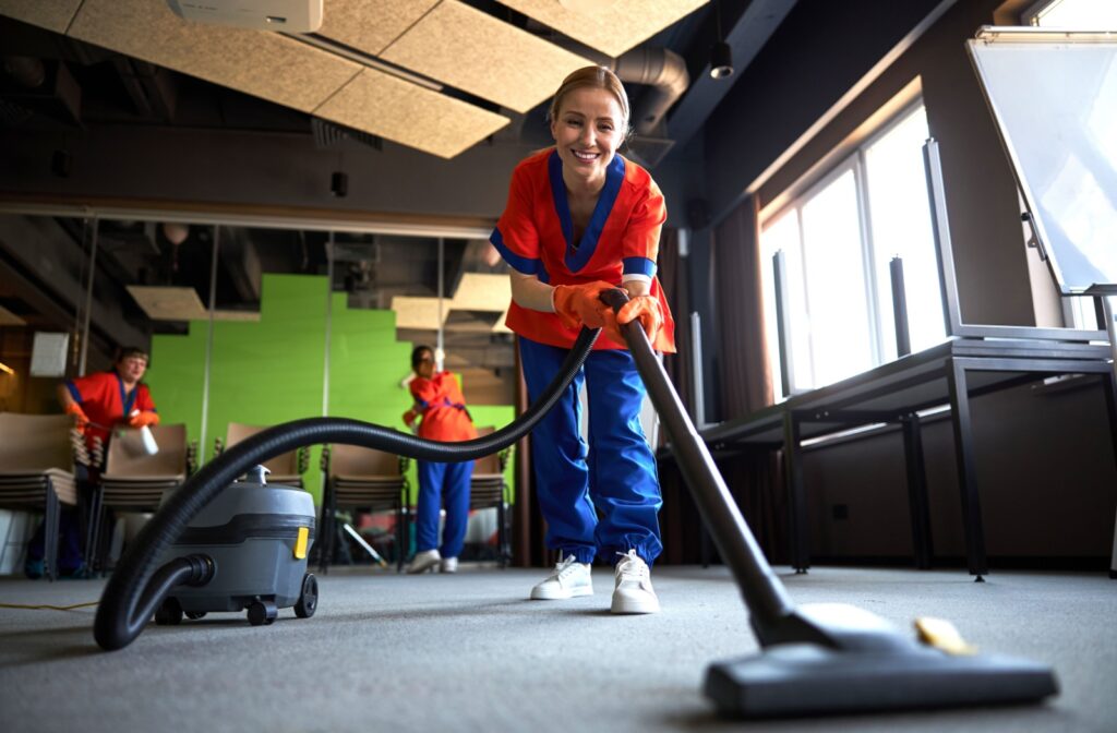 A professional team deeply cleans a high-traffic office area.