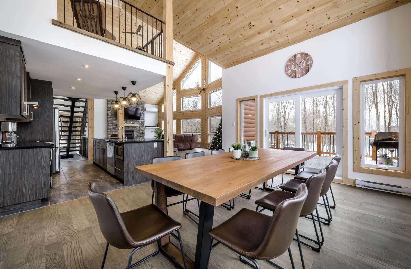 Dining and kitchen area of a cabin style airbnb rental property.